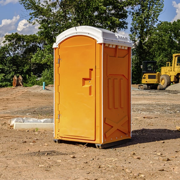 what is the cost difference between standard and deluxe portable restroom rentals in Grantham